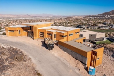 Available by winter 2025, this custom 2-story home is under on Dragon Ridge Country Club in Nevada - for sale on GolfHomes.com, golf home, golf lot