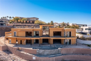 Available by winter 2025, this custom 2-story home is under on Dragon Ridge Country Club in Nevada - for sale on GolfHomes.com, golf home, golf lot