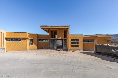 Available by winter 2025, this custom 2-story home is under on Dragon Ridge Country Club in Nevada - for sale on GolfHomes.com, golf home, golf lot