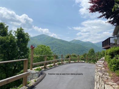 Priced well below assessed value. Great location and long range on Maggie Valley Resort and Country Club in North Carolina - for sale on GolfHomes.com, golf home, golf lot