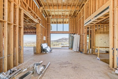 Available by winter 2025, this custom 2-story home is under on Dragon Ridge Country Club in Nevada - for sale on GolfHomes.com, golf home, golf lot