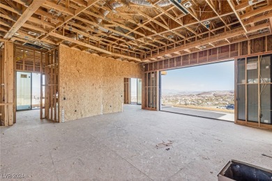 Available by winter 2025, this custom 2-story home is under on Dragon Ridge Country Club in Nevada - for sale on GolfHomes.com, golf home, golf lot