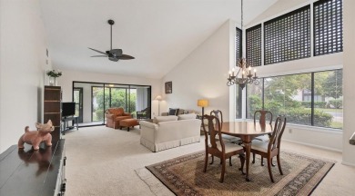 Beautiful end-unit with privacy and tranquil pond views in The on The Meadows Golf and Country Club in Florida - for sale on GolfHomes.com, golf home, golf lot