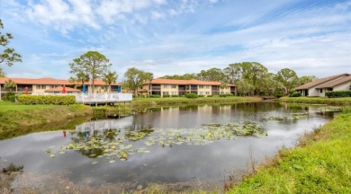 Beautiful end-unit with privacy and tranquil pond views in The on The Meadows Golf and Country Club in Florida - for sale on GolfHomes.com, golf home, golf lot