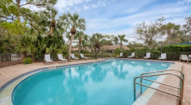 Beautiful end-unit with privacy and tranquil pond views in The on The Meadows Golf and Country Club in Florida - for sale on GolfHomes.com, golf home, golf lot