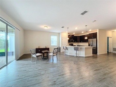 Check out this magnificent 4-bedroom 2-bath home in the much on ChampionsGate Golf Resort in Florida - for sale on GolfHomes.com, golf home, golf lot