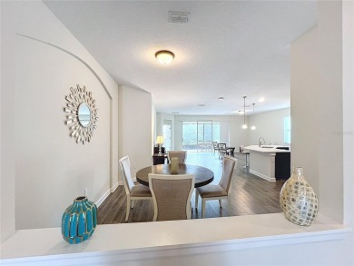 Check out this magnificent 4-bedroom 2-bath home in the much on ChampionsGate Golf Resort in Florida - for sale on GolfHomes.com, golf home, golf lot