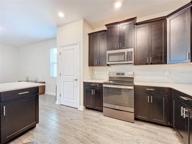 Check out this magnificent 4-bedroom 2-bath home in the much on ChampionsGate Golf Resort in Florida - for sale on GolfHomes.com, golf home, golf lot