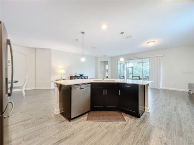 Check out this magnificent 4-bedroom 2-bath home in the much on ChampionsGate Golf Resort in Florida - for sale on GolfHomes.com, golf home, golf lot