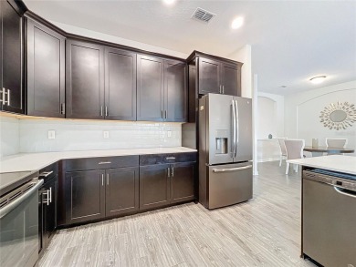Check out this magnificent 4-bedroom 2-bath home in the much on ChampionsGate Golf Resort in Florida - for sale on GolfHomes.com, golf home, golf lot