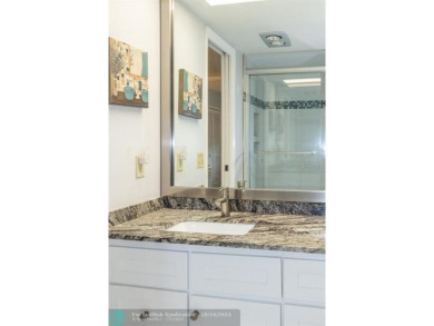 PRICE REDUCED. All the details that make a house a home with a on Palm-Aire Country Club and Resort - Palms in Florida - for sale on GolfHomes.com, golf home, golf lot