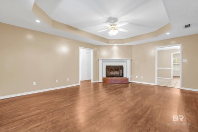 CHARMING three-bedroom, two-bath brick home situated in a quiet on Lake Forest Yacht and Country Club in Alabama - for sale on GolfHomes.com, golf home, golf lot