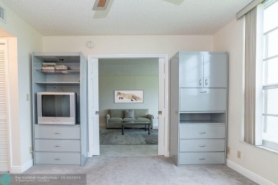 PRICE REDUCED. All the details that make a house a home with a on Palm-Aire Country Club and Resort - Palms in Florida - for sale on GolfHomes.com, golf home, golf lot