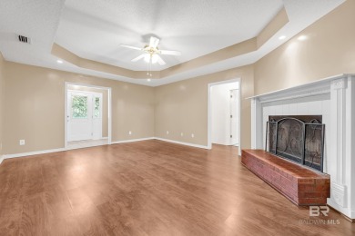 CHARMING three-bedroom, two-bath brick home situated in a quiet on Lake Forest Yacht and Country Club in Alabama - for sale on GolfHomes.com, golf home, golf lot