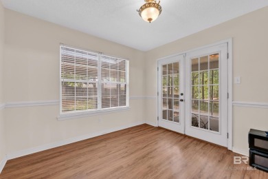 CHARMING three-bedroom, two-bath brick home situated in a quiet on Lake Forest Yacht and Country Club in Alabama - for sale on GolfHomes.com, golf home, golf lot