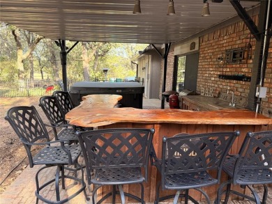 Come enjoy peaceful living near beautiful Lake Bridgeport in the on The Club At Runaway Bay in Texas - for sale on GolfHomes.com, golf home, golf lot