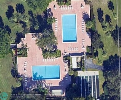 PRICE REDUCED. All the details that make a house a home with a on Palm-Aire Country Club and Resort - Palms in Florida - for sale on GolfHomes.com, golf home, golf lot
