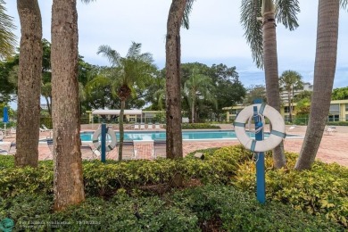 PRICE REDUCED. All the details that make a house a home with a on Palm-Aire Country Club and Resort - Palms in Florida - for sale on GolfHomes.com, golf home, golf lot