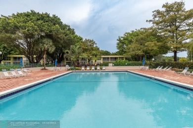 PRICE REDUCED. All the details that make a house a home with a on Palm-Aire Country Club and Resort - Palms in Florida - for sale on GolfHomes.com, golf home, golf lot