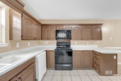 CHARMING three-bedroom, two-bath brick home situated in a quiet on Lake Forest Yacht and Country Club in Alabama - for sale on GolfHomes.com, golf home, golf lot