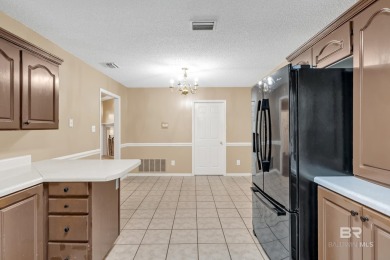 CHARMING three-bedroom, two-bath brick home situated in a quiet on Lake Forest Yacht and Country Club in Alabama - for sale on GolfHomes.com, golf home, golf lot