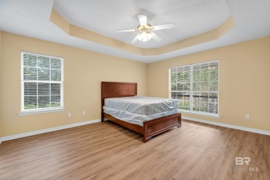 CHARMING three-bedroom, two-bath brick home situated in a quiet on Lake Forest Yacht and Country Club in Alabama - for sale on GolfHomes.com, golf home, golf lot