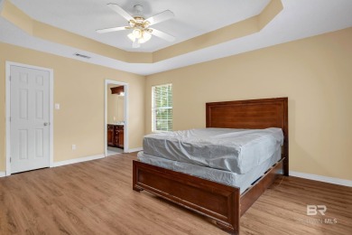 CHARMING three-bedroom, two-bath brick home situated in a quiet on Lake Forest Yacht and Country Club in Alabama - for sale on GolfHomes.com, golf home, golf lot