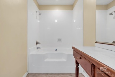 CHARMING three-bedroom, two-bath brick home situated in a quiet on Lake Forest Yacht and Country Club in Alabama - for sale on GolfHomes.com, golf home, golf lot