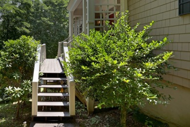 Experience serene living with panoramic mountain and golf course on Brasstown Valley Resort and Spa in Georgia - for sale on GolfHomes.com, golf home, golf lot