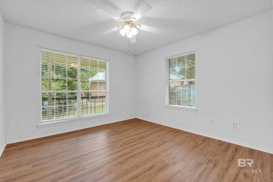 CHARMING three-bedroom, two-bath brick home situated in a quiet on Lake Forest Yacht and Country Club in Alabama - for sale on GolfHomes.com, golf home, golf lot