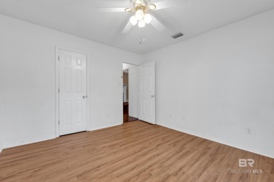 CHARMING three-bedroom, two-bath brick home situated in a quiet on Lake Forest Yacht and Country Club in Alabama - for sale on GolfHomes.com, golf home, golf lot