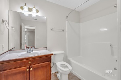 CHARMING three-bedroom, two-bath brick home situated in a quiet on Lake Forest Yacht and Country Club in Alabama - for sale on GolfHomes.com, golf home, golf lot