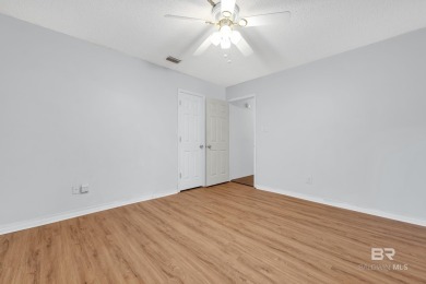CHARMING three-bedroom, two-bath brick home situated in a quiet on Lake Forest Yacht and Country Club in Alabama - for sale on GolfHomes.com, golf home, golf lot