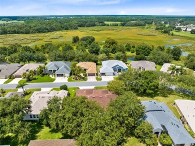 Welcome to this stunning ranch home located behind the guard on Monarch At Royal Highlands in Florida - for sale on GolfHomes.com, golf home, golf lot