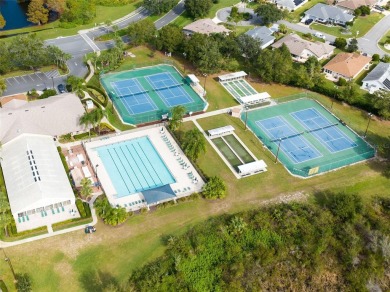 Welcome to this stunning ranch home located behind the guard on Monarch At Royal Highlands in Florida - for sale on GolfHomes.com, golf home, golf lot