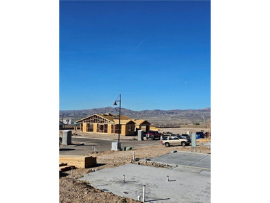 Located in the Prestigious North Fork Community of Laughlin on Laughlin Ranch Golf Club in Arizona - for sale on GolfHomes.com, golf home, golf lot