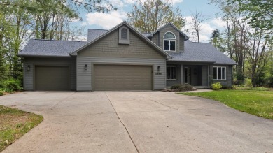 Welcome to this impeccably maintained ranch, ideally situated on on The Loon Golf Resort in Michigan - for sale on GolfHomes.com, golf home, golf lot