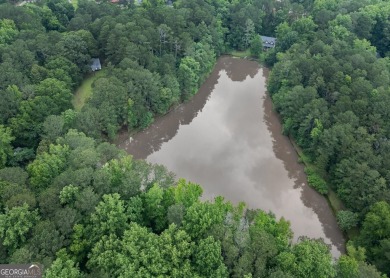 A hidden gem and rare opportunity right off the desirable on Indian Creek Golf Club in Georgia - for sale on GolfHomes.com, golf home, golf lot