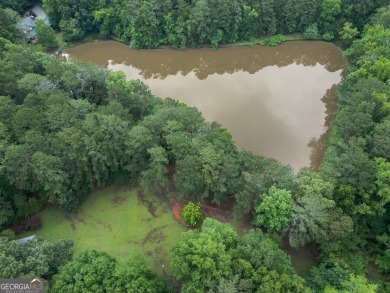 A hidden gem and rare opportunity right off the desirable on Indian Creek Golf Club in Georgia - for sale on GolfHomes.com, golf home, golf lot