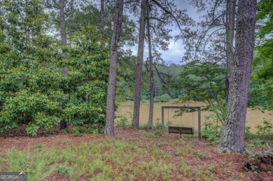 A hidden gem and rare opportunity right off the desirable on Indian Creek Golf Club in Georgia - for sale on GolfHomes.com, golf home, golf lot