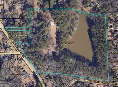 A hidden gem and rare opportunity right off the desirable on Indian Creek Golf Club in Georgia - for sale on GolfHomes.com, golf home, golf lot