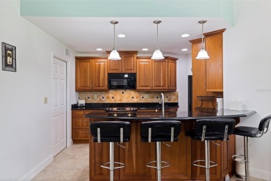This beautiful, fully renovated and furnished condo offers a on Isla Del Sol Yacht and Country Club in Florida - for sale on GolfHomes.com, golf home, golf lot