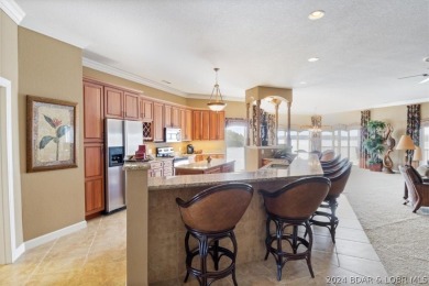 If you are looking for an awesome view of the lake, then this on Seasons Ridge At Four Seasons in Missouri - for sale on GolfHomes.com, golf home, golf lot