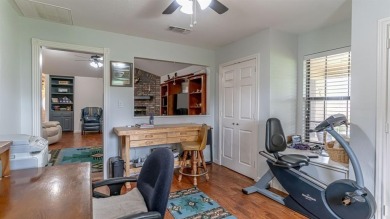 A beautiful Pecan Plantation golf course home sitting on the on Pecan Plantation Country Club in Texas - for sale on GolfHomes.com, golf home, golf lot