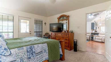A beautiful Pecan Plantation golf course home sitting on the on Pecan Plantation Country Club in Texas - for sale on GolfHomes.com, golf home, golf lot