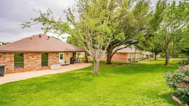 A beautiful Pecan Plantation golf course home sitting on the on Pecan Plantation Country Club in Texas - for sale on GolfHomes.com, golf home, golf lot