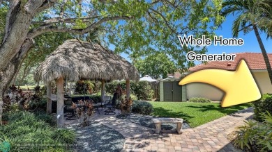 Located on the edge of Coral Springs FL, this unique home blends on The Carolina Club in Florida - for sale on GolfHomes.com, golf home, golf lot