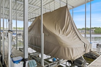 If you are looking for an awesome view of the lake, then this on Seasons Ridge At Four Seasons in Missouri - for sale on GolfHomes.com, golf home, golf lot