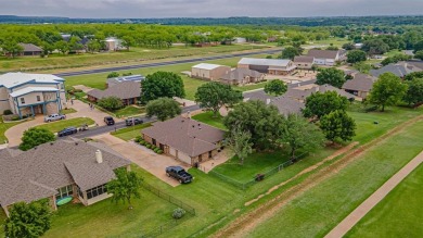 A beautiful Pecan Plantation golf course home sitting on the on Pecan Plantation Country Club in Texas - for sale on GolfHomes.com, golf home, golf lot
