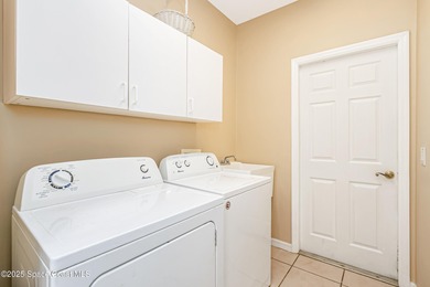 Welcome to Aquarina! This is the lowest priced townhome in the on Aquarina Beach and Country Club in Florida - for sale on GolfHomes.com, golf home, golf lot